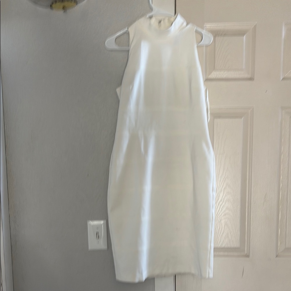 Women’s White House and Black Market size 6 ivory halter dress